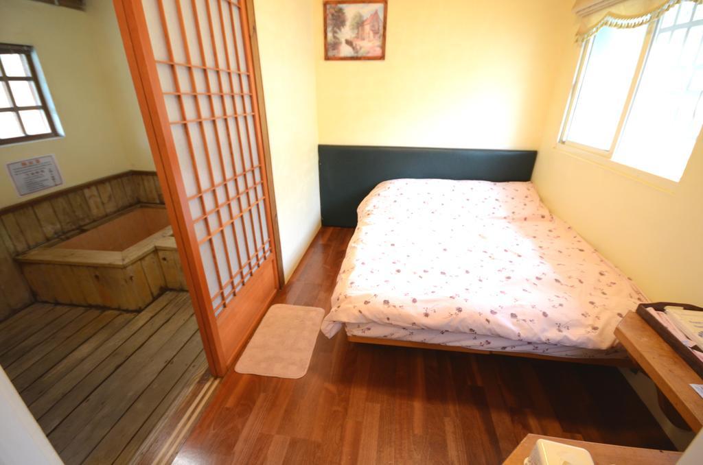 Junbuna Homestay Zsujszuj Szoba fotó