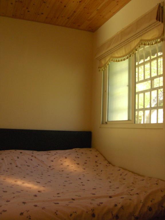 Junbuna Homestay Zsujszuj Szoba fotó